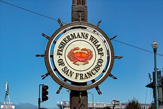Fisherman's Wharf logo with crab symbol