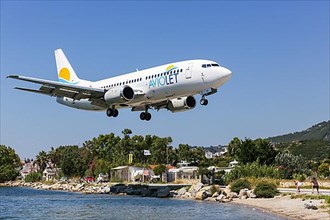 An Aviolet Boeing 737-300 aircraft with registration YU-AND lands at Skiathos Airport