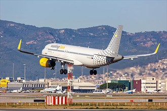 A Vueling Airbus A320 with registration EC-MJB lands at Barcelona Airport