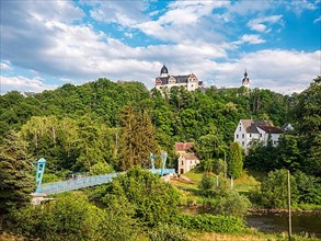 Rochsburg village and castle with suspension bridge over the Zwickauer Mulde