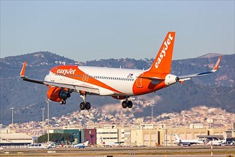 An EasyJet Europe Airbus A320 with registration OE-IVJ lands at Barcelona Airport