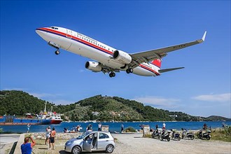 A Meridiana Boeing 737-800 aircraft with registration EI-FFK lands at Skiathos airport
