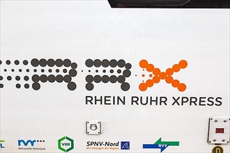 Logo Rhein Ruhr Xpress RRX on a train at the main station in Cologne