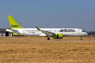 An Air Baltic Airbus A220-300 with registration number YL-AAQ at Stuttgart Airport