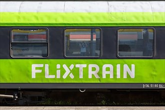 Flixtrain logo on a train at the main station in Stuttgart
