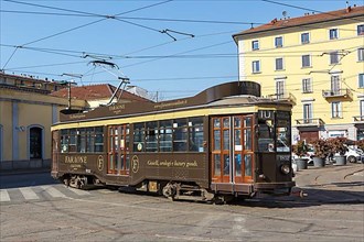 Old tram of the type Ventotto Tram Milano public transport transport transport at the stop Stazione Genova in Milan