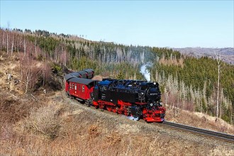 Steam train of the Brockenbahn railway steam railway near Drei Annen Hohne