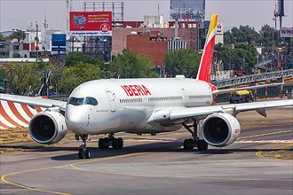 An Iberia Airbus A350-900 aircraft with registration number EC-NGT at Mexico City Airport