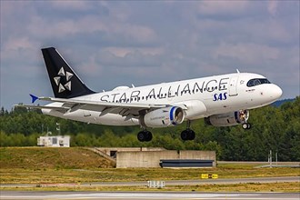 An SAS Scandinavian Airlines Airbus A319 aircraft with registration number OY-KBP and Star Alliance special livery at Oslo Gardermoen Airport