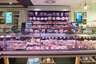 Service counter for meat and sausage products. Edeka Niemerszein