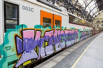 Graffiti on a train at Franca railway station in Barcelona