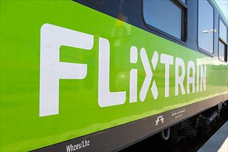 Flixtrain logo on a train at the main station in Stuttgart