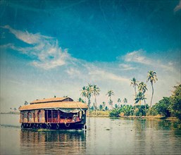Vintage retro hipster style travel image of travel tourism Kerala background