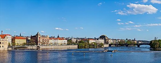 Panorama of Prague Stare Mesto embankment and Vltava river view from Charles bridge. Prague