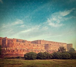 Vintage retro hipster style travel image of Agra Fort with grunge texture overlaid. Agra