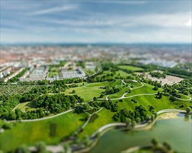 Aerial view of Olympiapark and Munich from Olympiaturm Olympic Tower with tilt shift toy effect shallow depth of field. Munich