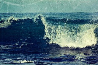 Vintage retro hipster style travel image of wave close up in ocean with grunge texture overlaid. Sri Lanka