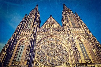 Vintage retro hipster style travel image of gothic architecture facade of St. Vitus Catherdal