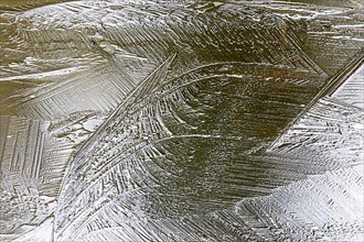 Creative photo. Patterns on a frozen lake