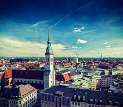 Vintage retro effect filtered hipster style travel image of aerial view of Munich and St. Peter Church