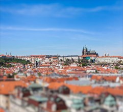 View of Stare Mesto Old City and St. Vitus Cathedral from Town Hall with tilt shift toy effect shallow depth of field. Prague
