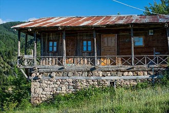Wooden house in green in the country in Turkey
