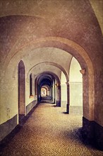 Vintage retro hipster style travel image of arcade in Prague