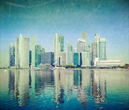 Modern city skyline of business district downtown of Singapore in day with grunge texture overlaid