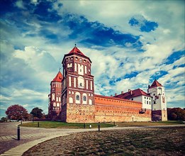Vintage retro effect filtered hipster style travel image of medieval Mir castle famous landmark in town Mir