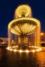 Fountain in the Geschwister-Scholl-Platz in the evening. Munich