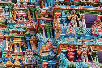 Sculptures on Hindu temple gopura tower. Meenakshi Temple