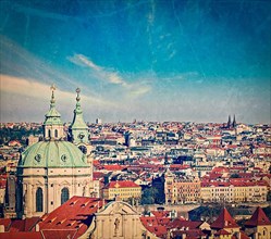 Vintage retro hipster style travel image of aerial view of Prague from Prague Castle. Prague