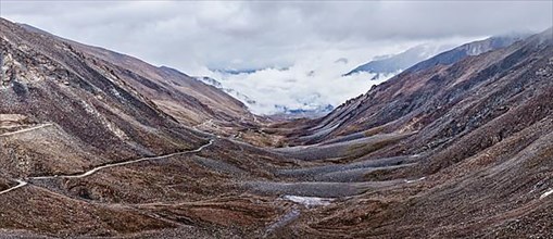 Himalayan valley landscape with road near Kunzum La pass