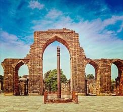 Vintage retro effect filtered hipster style travel image of Iron pillar in Qutub complex