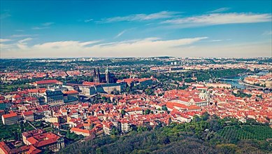 Vintage retro hipster style travel image of aerial panorama of Hradchany: the Saint Vitus