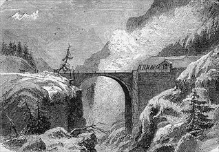An arched bridge on the road over the San Bernardino Pass in the Alps