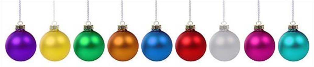 Christmas colourful Christmas baubles ball colours in a row clipping against a white background