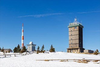 Summit of the Brocken mountain in the Harz mountains with snow in winter at the Brocken