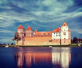 Vintage retro effect filtered hipster style travel image of medieval Mir castle famous landmark in town Mir
