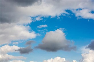White color clouds found in the blue sky background