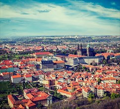 Vintage retro hipster style travel image of aerial view of Hradchany part of Prague: the Saint Vitus