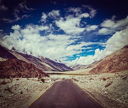 Vintage retro effect filtered hipster style travel image of Road in Himalayan landscape in Nubra valley in Himalayas. Ladakh