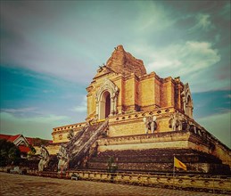Vintage retro hipster style travel image of Buddhist temple Wat Chedi Luang. Chiang Mai