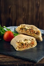 Spicy ciabatta stuffed with fried beef mince