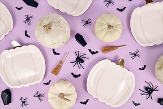 Halloween party flat lay with pumpkin shaped plates