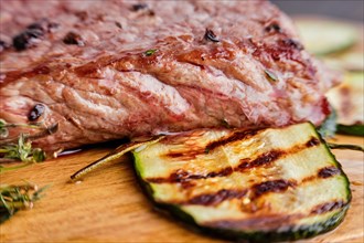 Macro photo with shallow depth of field of grilled beef steak