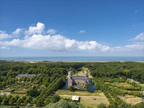 Aerial view of Westhove Castle with coastal landscape and view of the North Sea