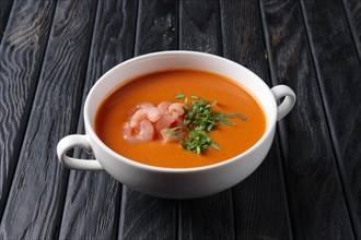 Rustic tomato soup with shrimps
