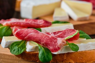 Sandwich with camembert cheese and smoked bacon