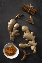 Top view ginger roots with cinnamon sticks. Resolution and high quality beautiful photo
